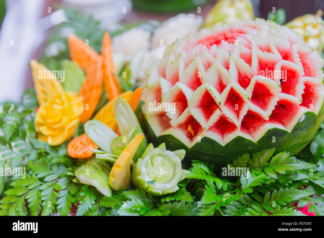 Thai food traditional art craft engrave on fruit and vegetable in cuisine decoration Stock Photo