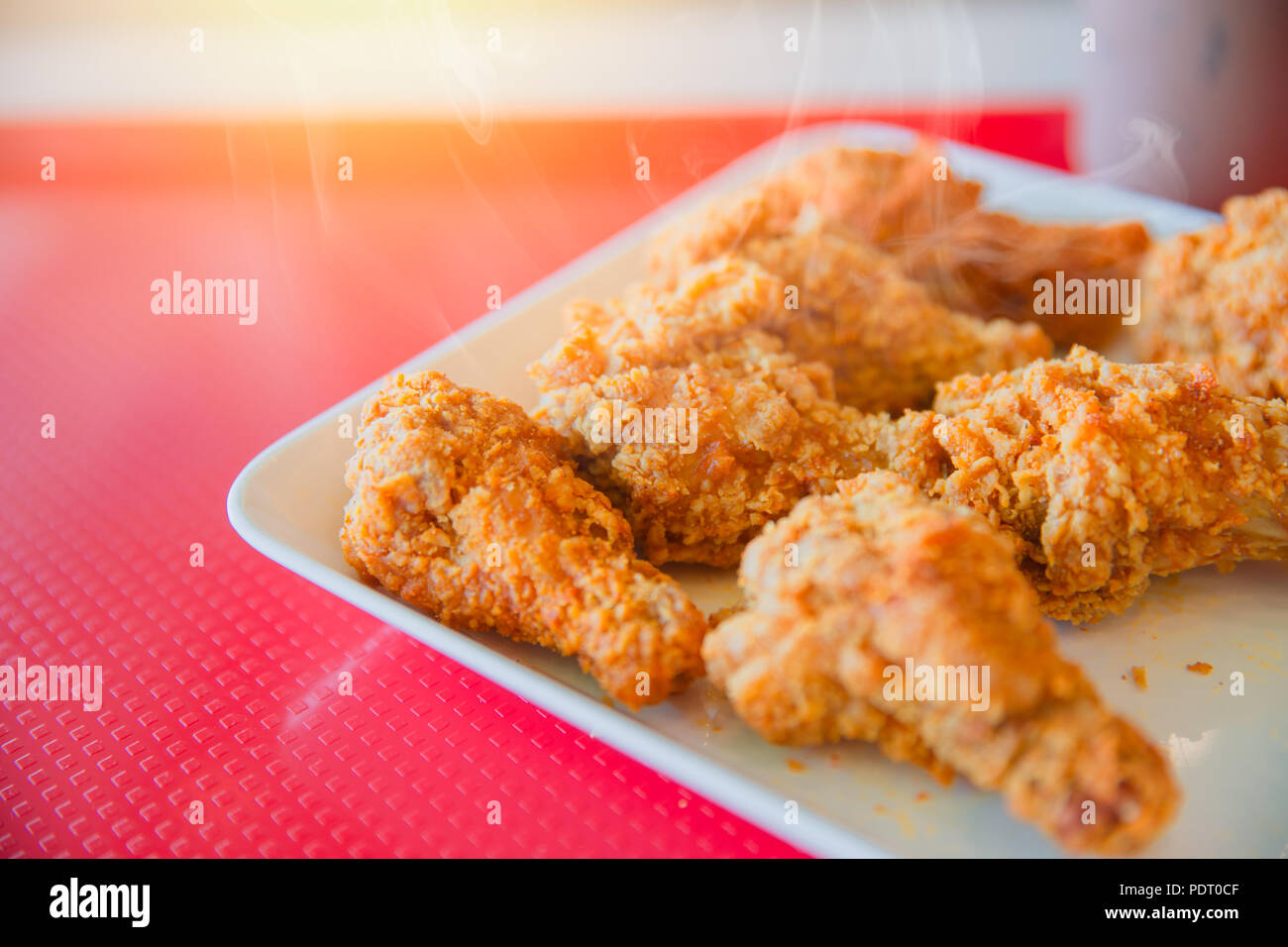 Hot Kentucky style fried chicken yummy tasty happy meal of fast food american pop culture Stock Photo