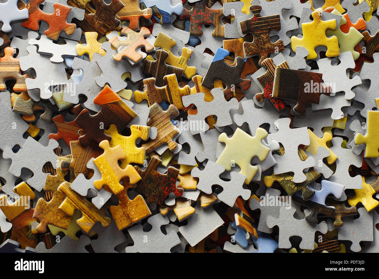 random jigsaw puzzle pieces background Stock Photo