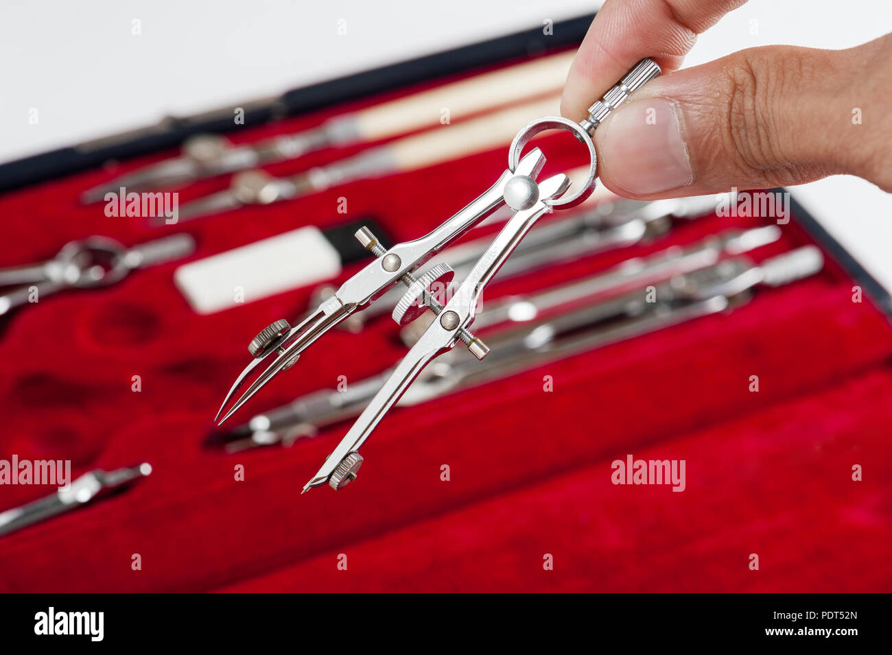 closeup compass (drawing tool) with the box set as background Stock ...