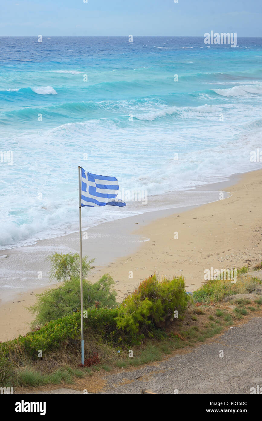 Greece flag on Lefkada beach Stock Photo