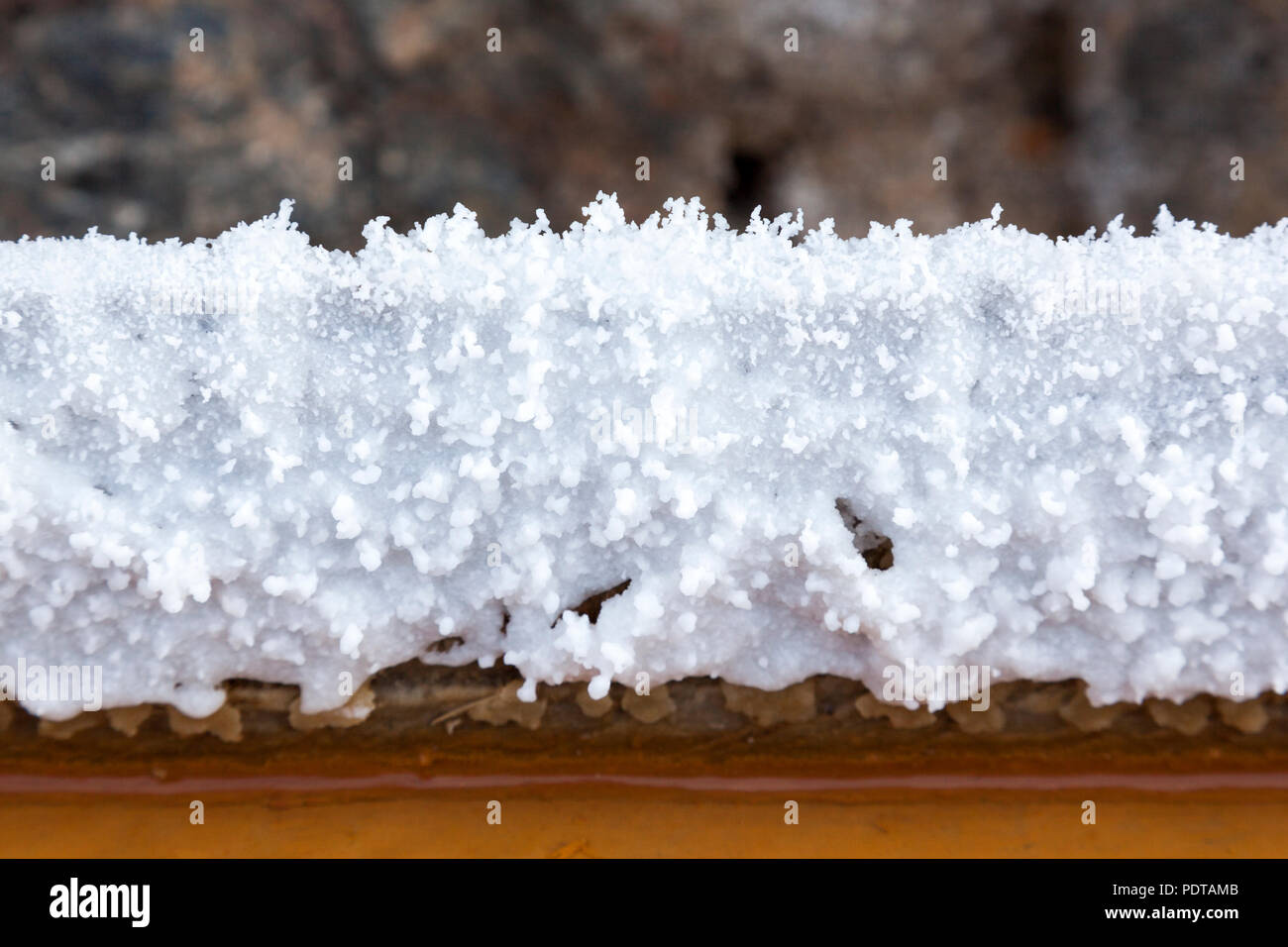 Precipitated salt in natural salt making plant Stock Photo