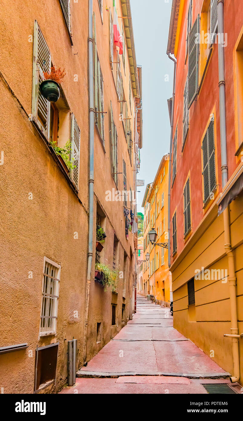 Narrow crooked street in the Old Town, Vieille Ville in Nice, French  Riviera Stock Photo