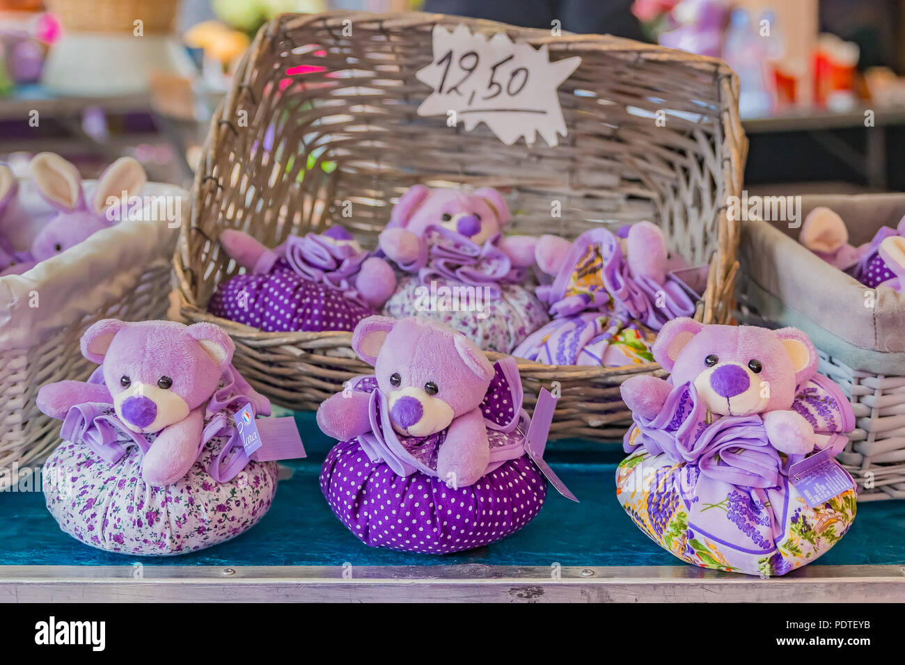 Colorful decorative sachets shaped like teddy bear toys filled with lavender at market at a market in Nice in the South of France Stock Photo