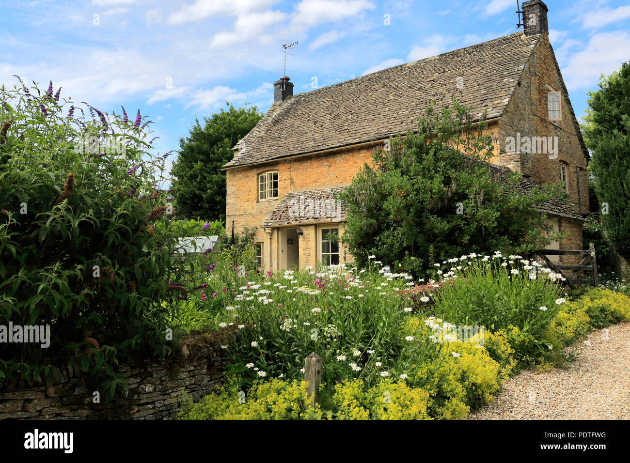 Cottage at Upper Slaughter village, Gloucestershire Cotswolds, England, UK Stock Photo