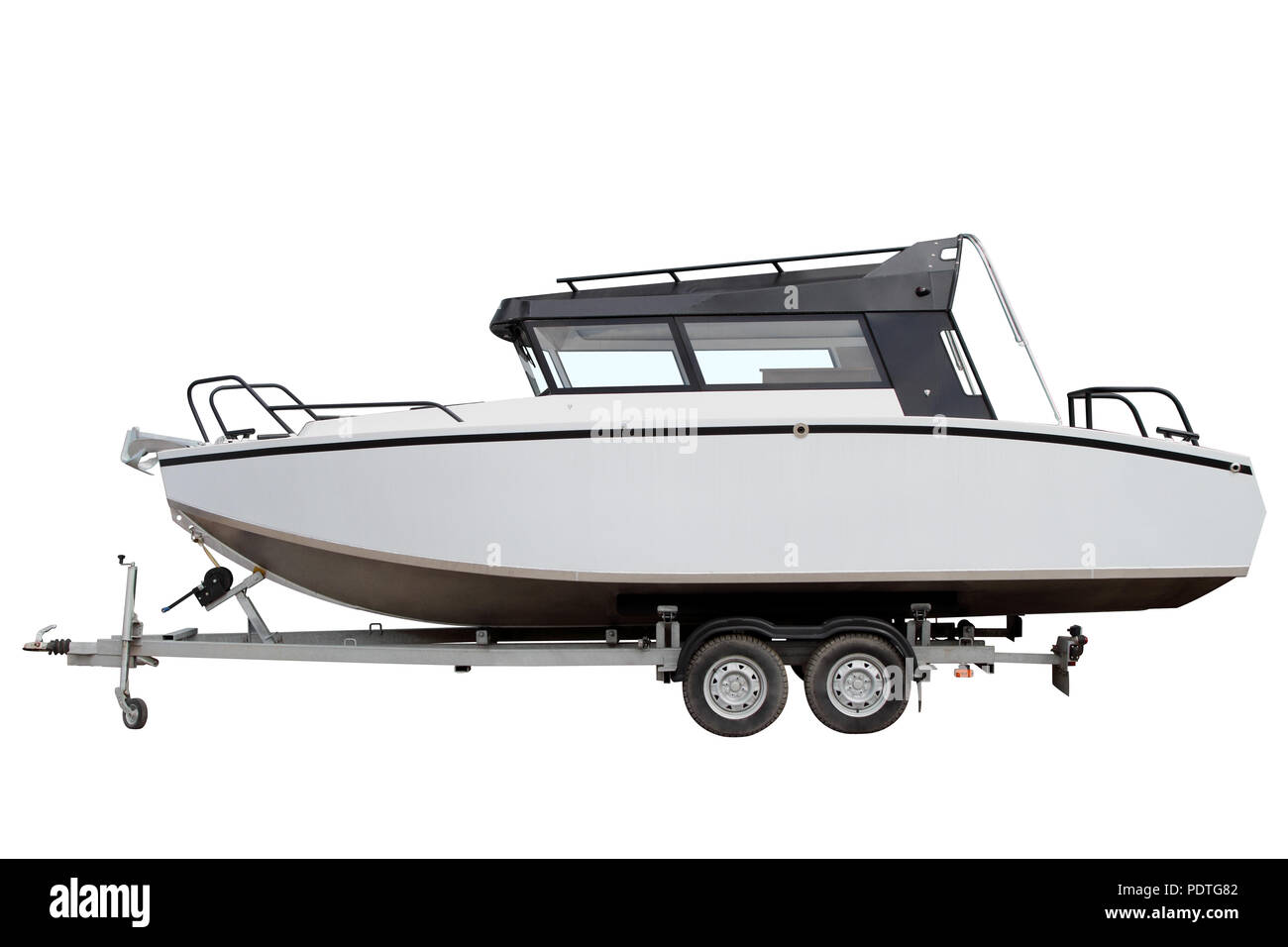 Modern motor boat is loaded onto a car trailer Stock Photo Alamy