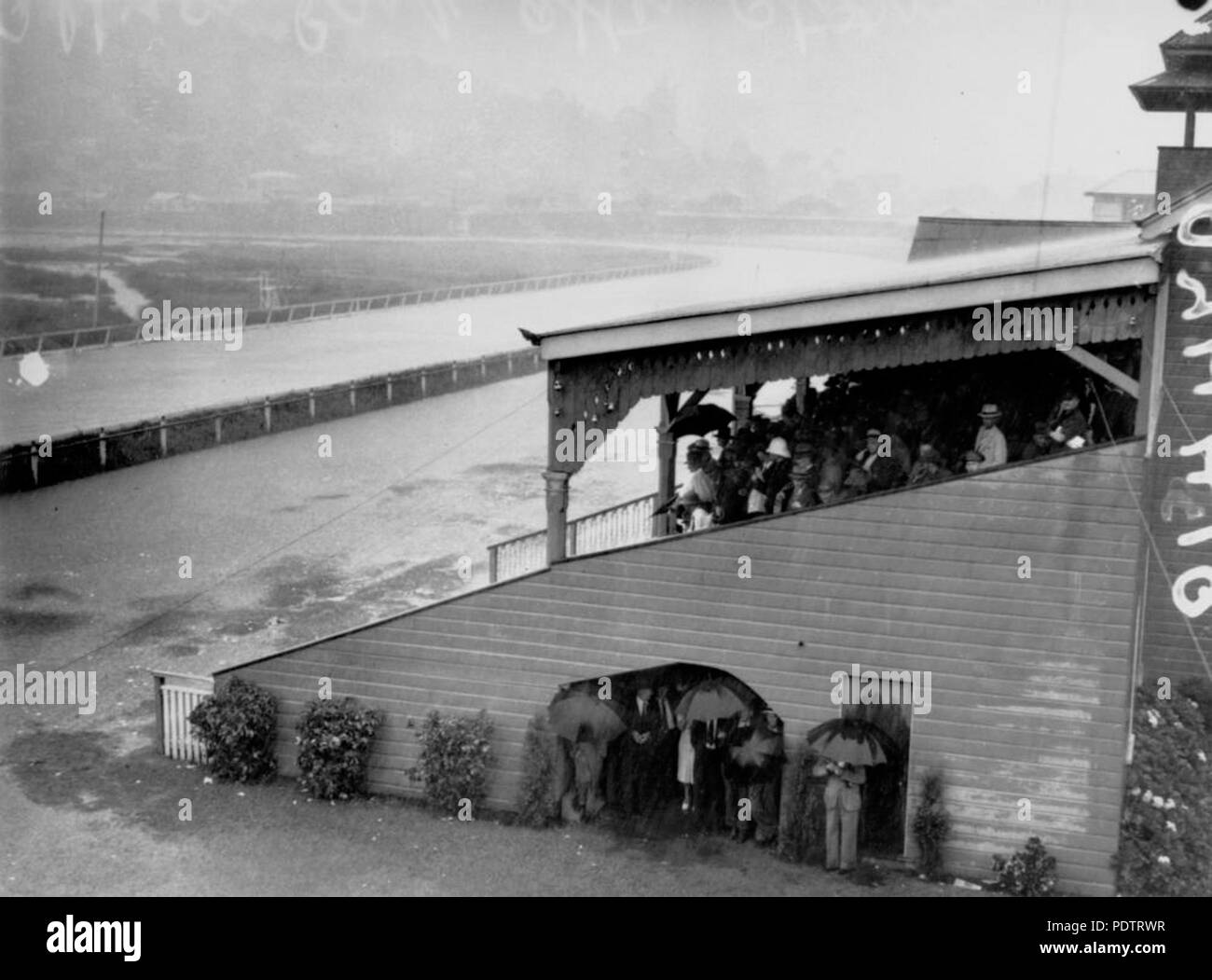 204 StateLibQld 1 108592 Albion Park racetrack after a storm, Brisbane, January 1941 Stock Photo