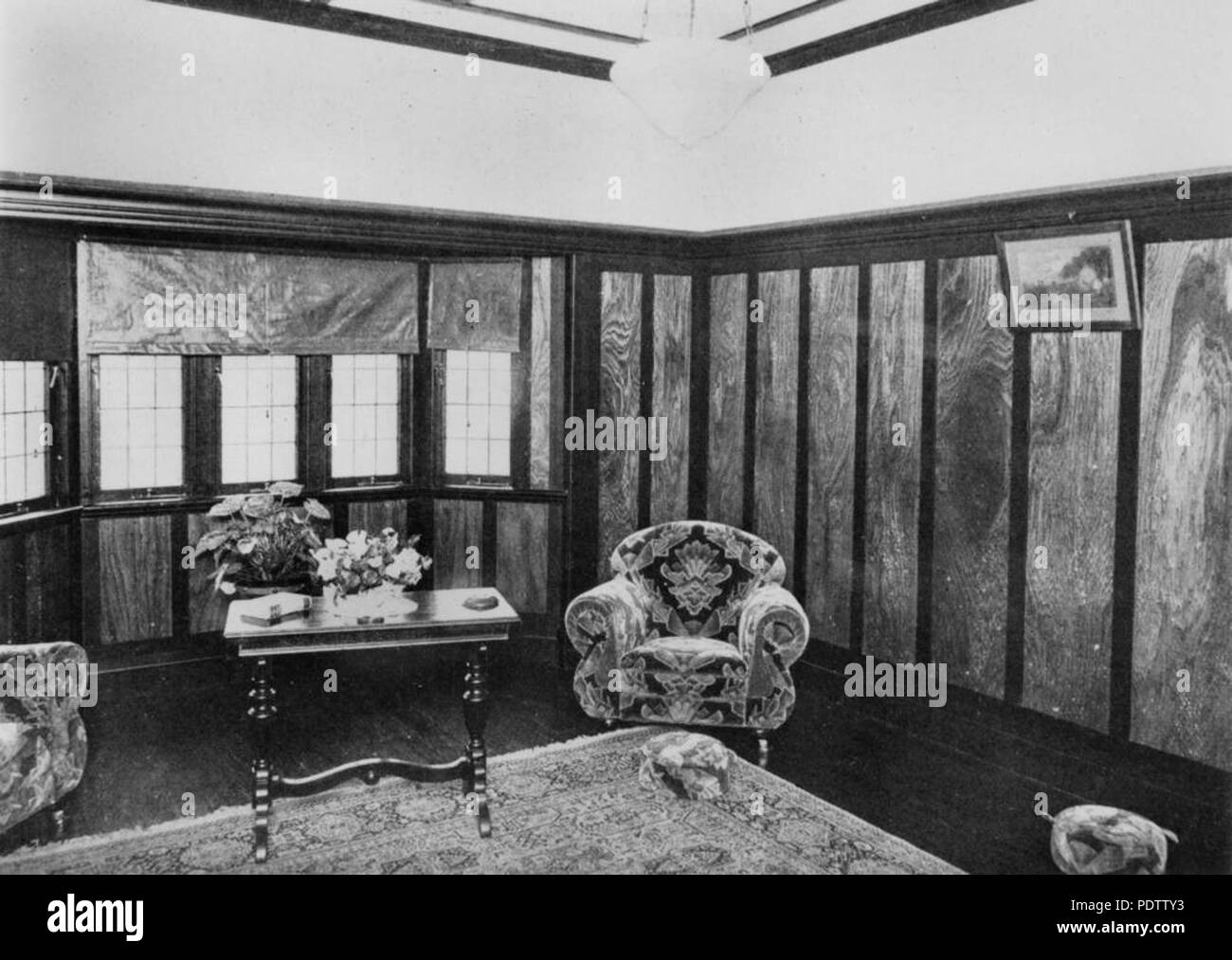 207 StateLibQld 1 113080 Red Tulip Oak plywood panelling used in a Brisbane residence, ca. 1933 Stock Photo