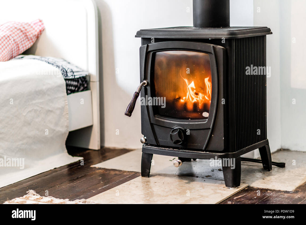 Wood Burning Stove In Bedroom Stock Photo 215064901 Alamy