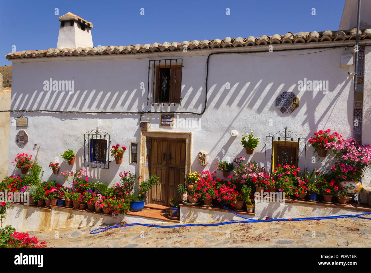 Pretty White Washed Spanish Houses in Small Rural Town of Oria in Andalucia Spain Stock Photo