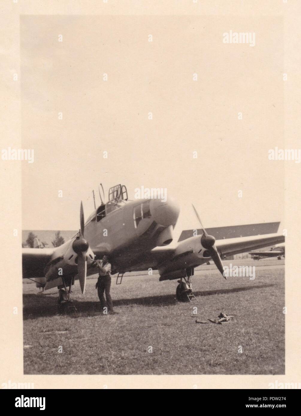 Image from the photo album of Oberfeldwebel Karl Gendner of 1. Staffel, Kampfgeschwader 40: A Luftwaffe Focke Wulf Fw 58 Weihe (Harrier), twin-engine, multi-role aircraft, undergoes checks on a German airfield. Stock Photo