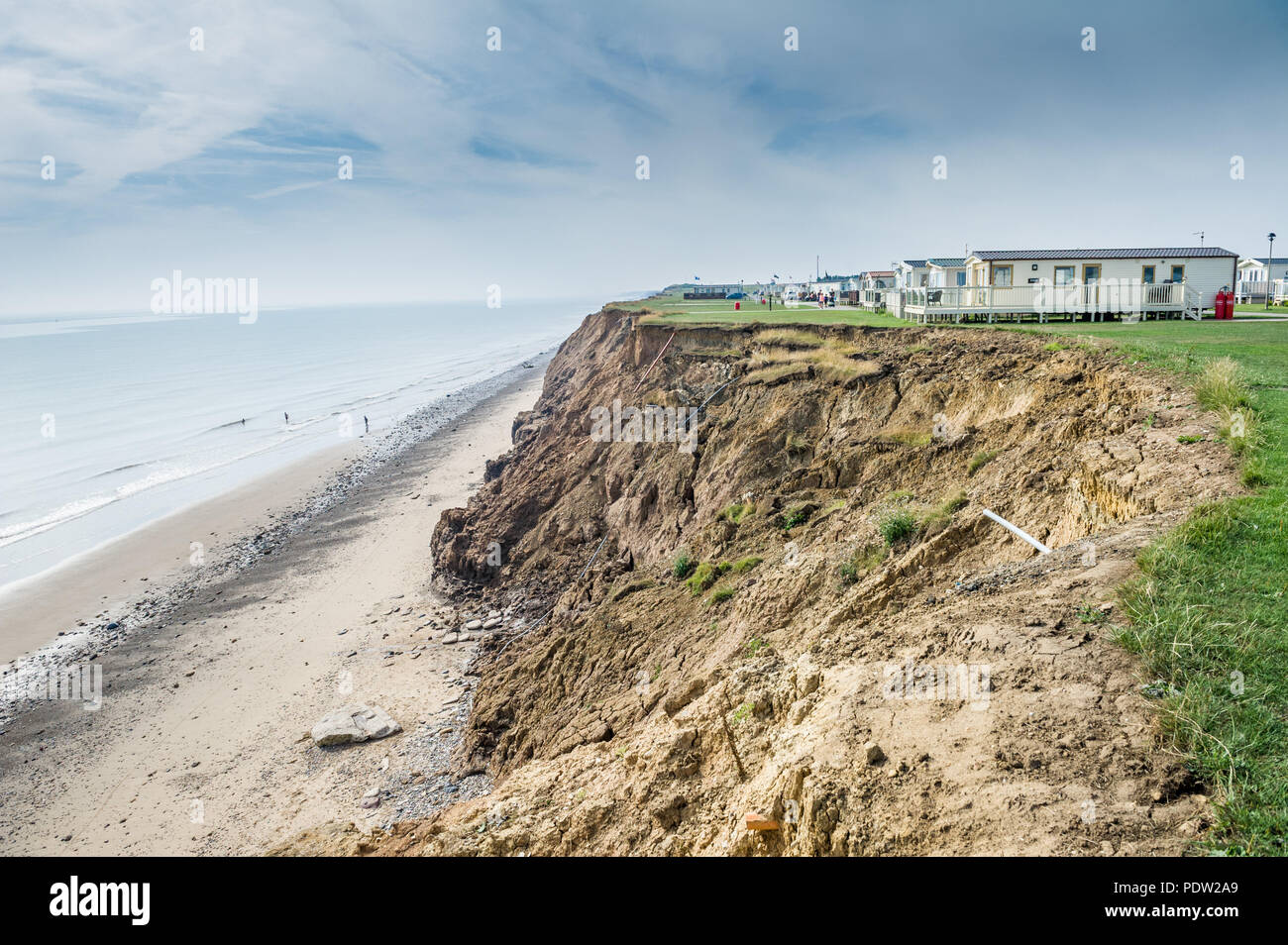 The fastest eroding coast line in the U.K. at Skipsea, Yorkshire, UK threatening a caravan site. Stock Photo