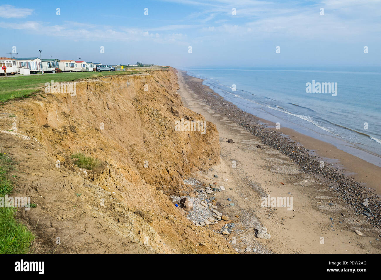 The fastest eroding coast line in the U.K. at Skipsea, Yorkshire, UK threatening a caravan site. Stock Photo