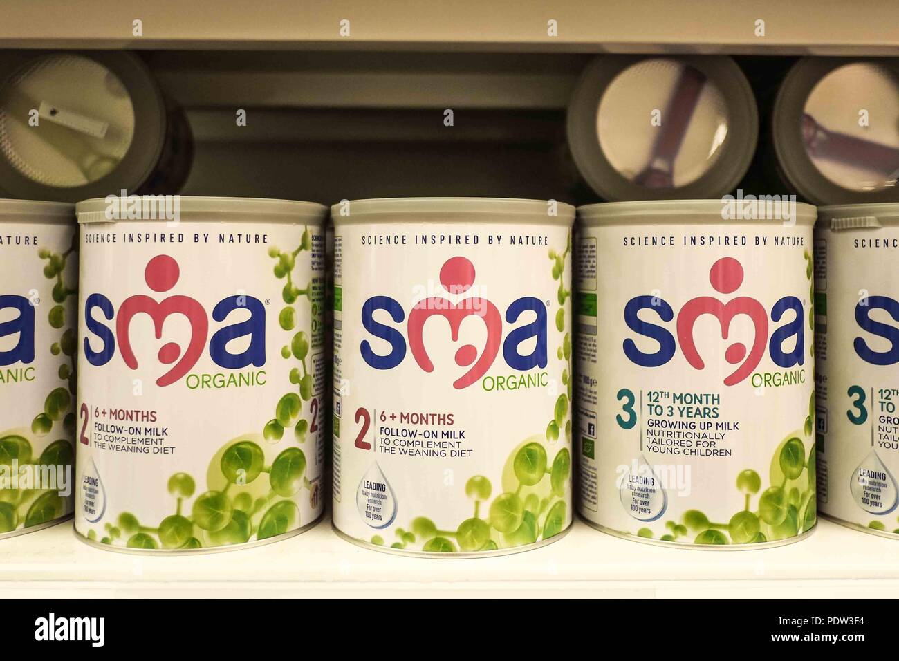 Organic baby milk formula in a UK supermarket Stock Photo