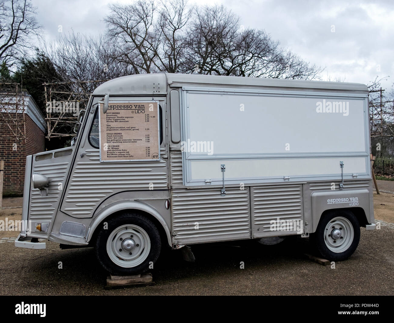 Old Silver Citroen type H Refreshment Van in Hyde Park, Central London next to Serpentine Lido. Closed for winter.  No people. Horizontal. Stock Photo