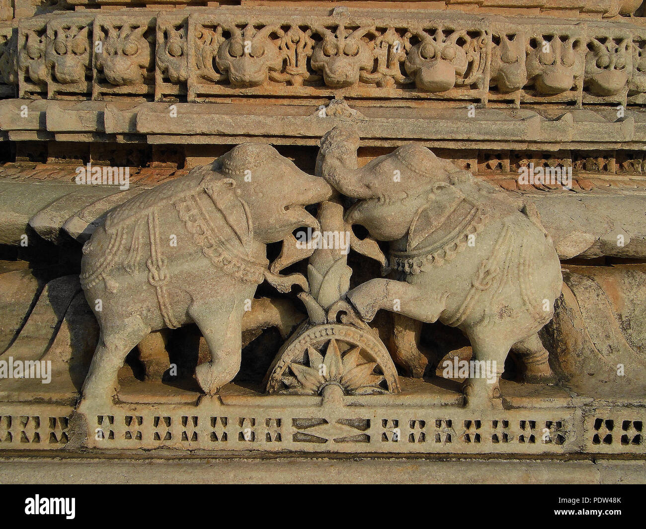 Carving on a temple wall- elephant fight Stock Photo