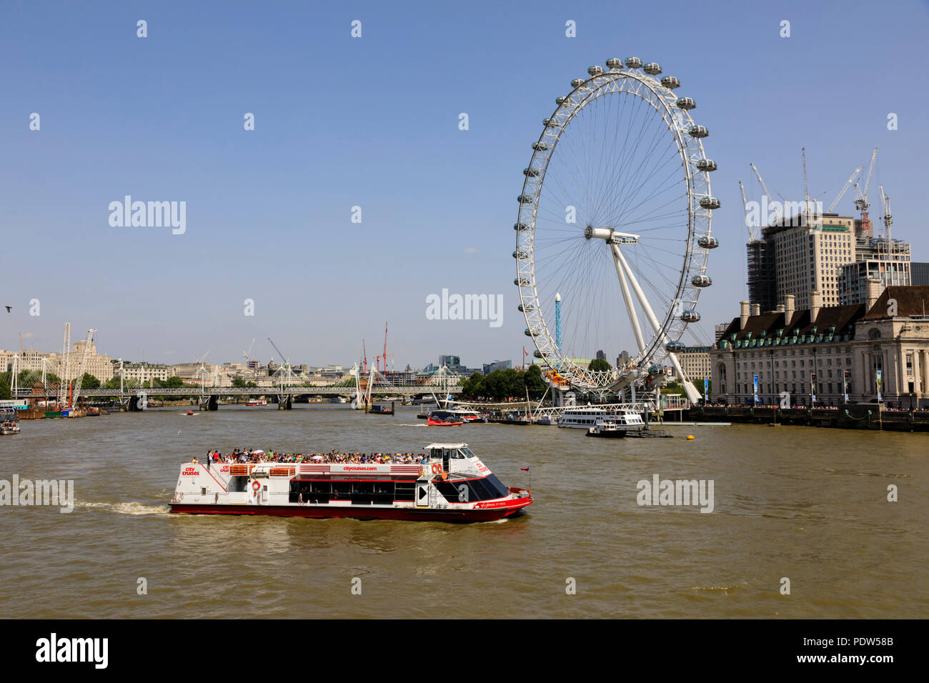 The Coca-Cola London Eye ferris wheel on the south bank of the River Thames, Lambeth, London, England Stock Photo