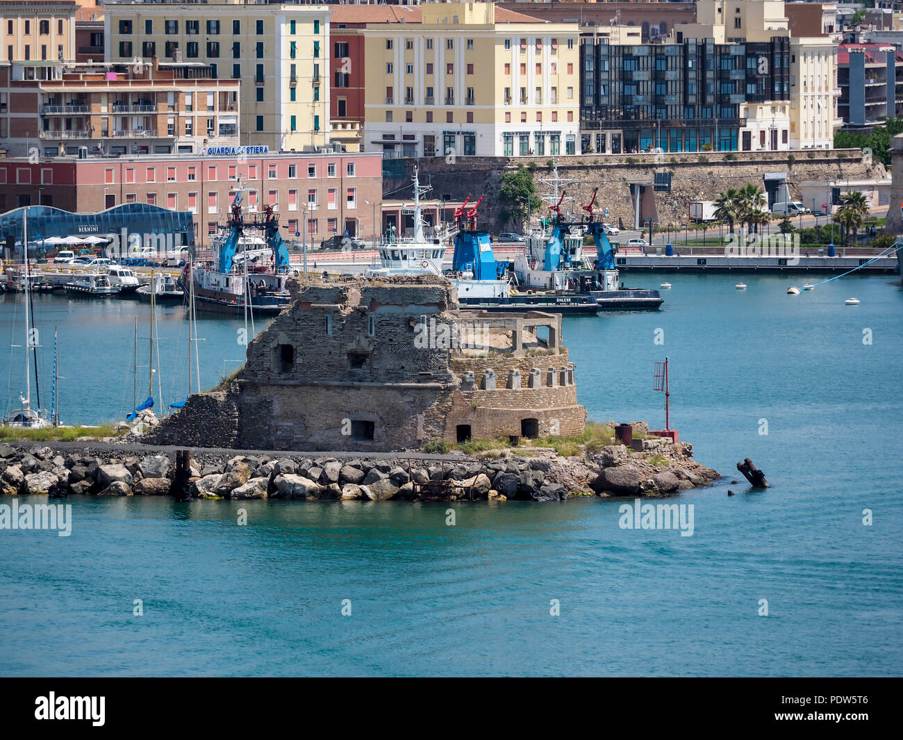 CIVITAVECCHIA, ITALY - MAY 20, 2018: View of the entrance to the port and  the Old Watch Tower Stock Photo - Alamy