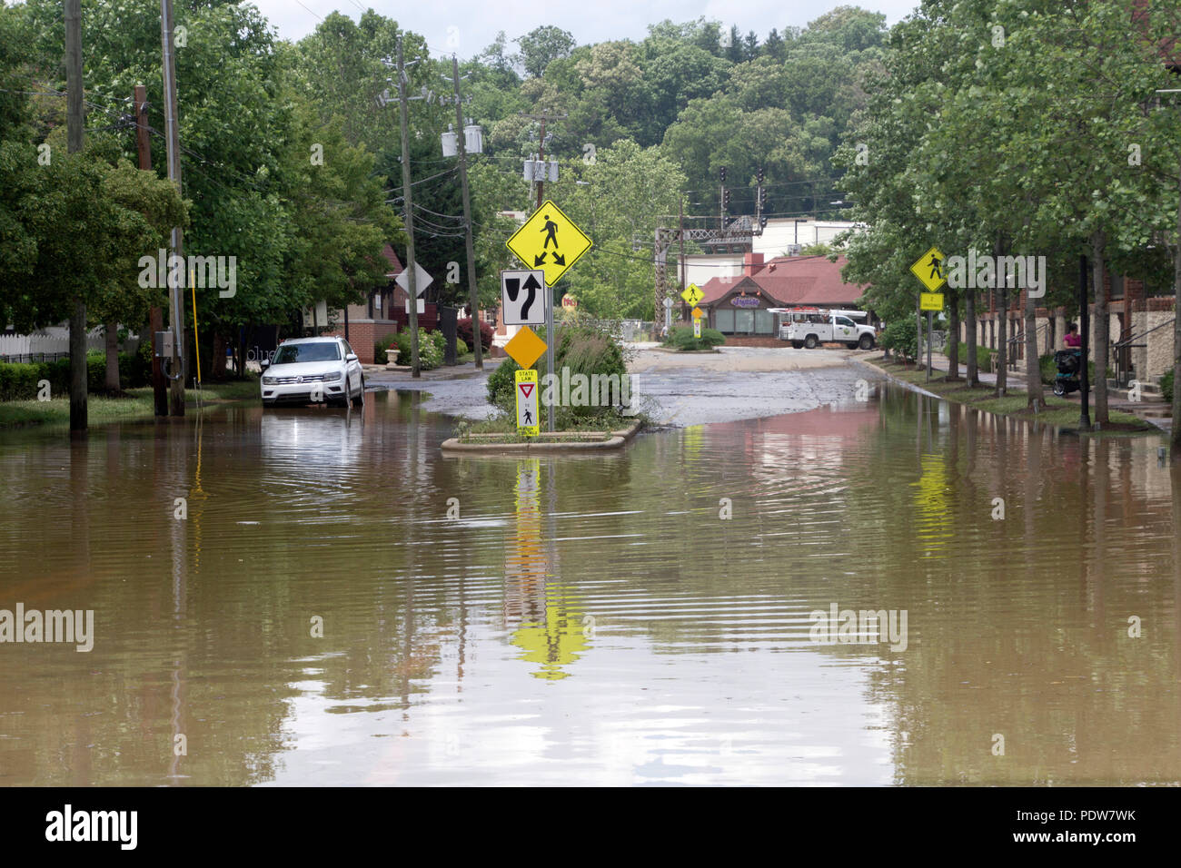 BILTMORE FOREST, NORTH CAROLINA, USA - MAY 30, 2018: A flooding river ...