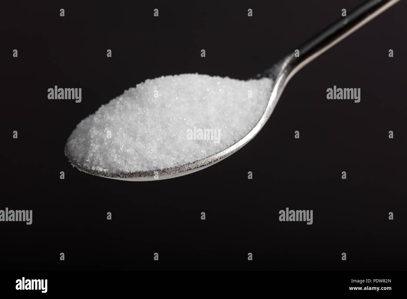 Teaspoon of table salt close up shot Stock Photo Alamy