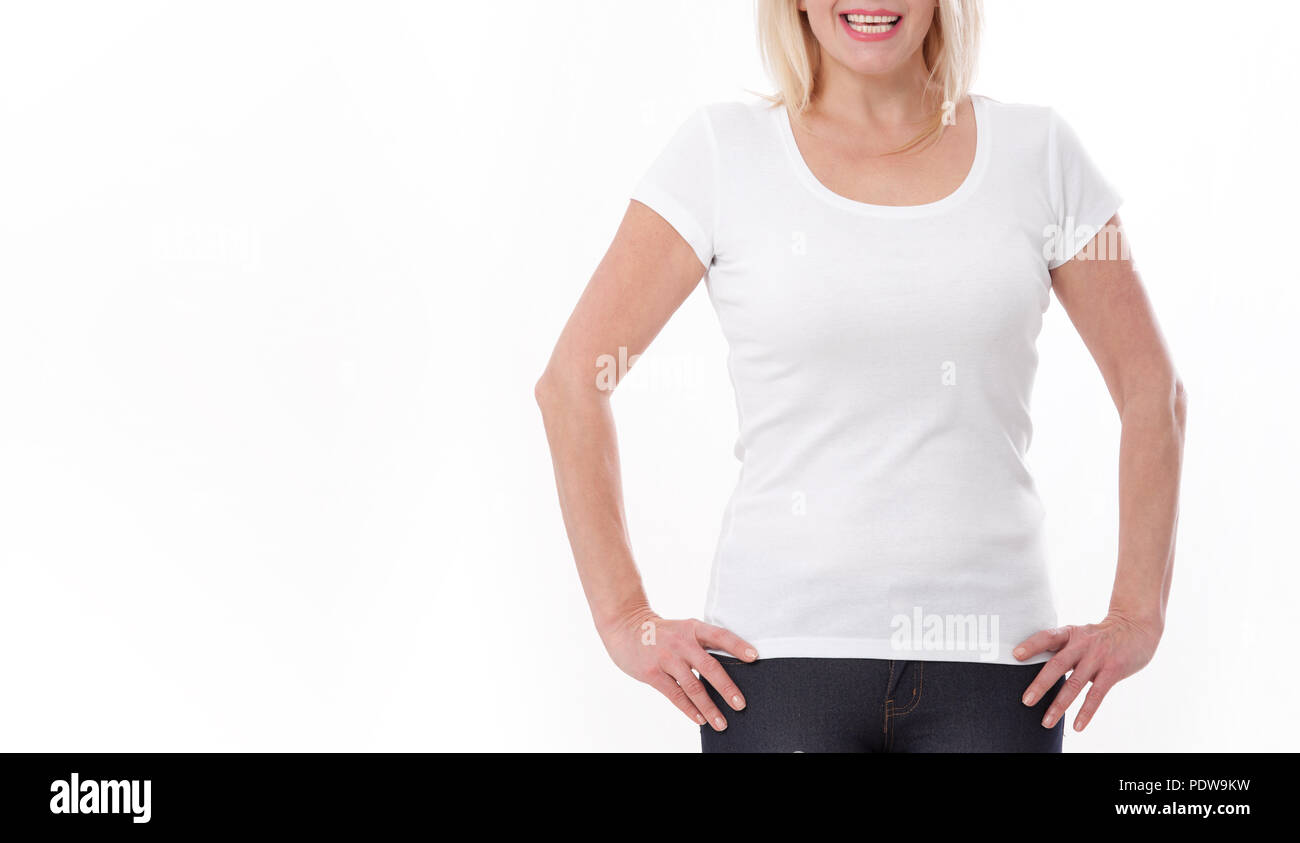 T-shirt design and people concept - close up of woman in blank white shirt, shirt front isolated. Mock up. Stock Photo