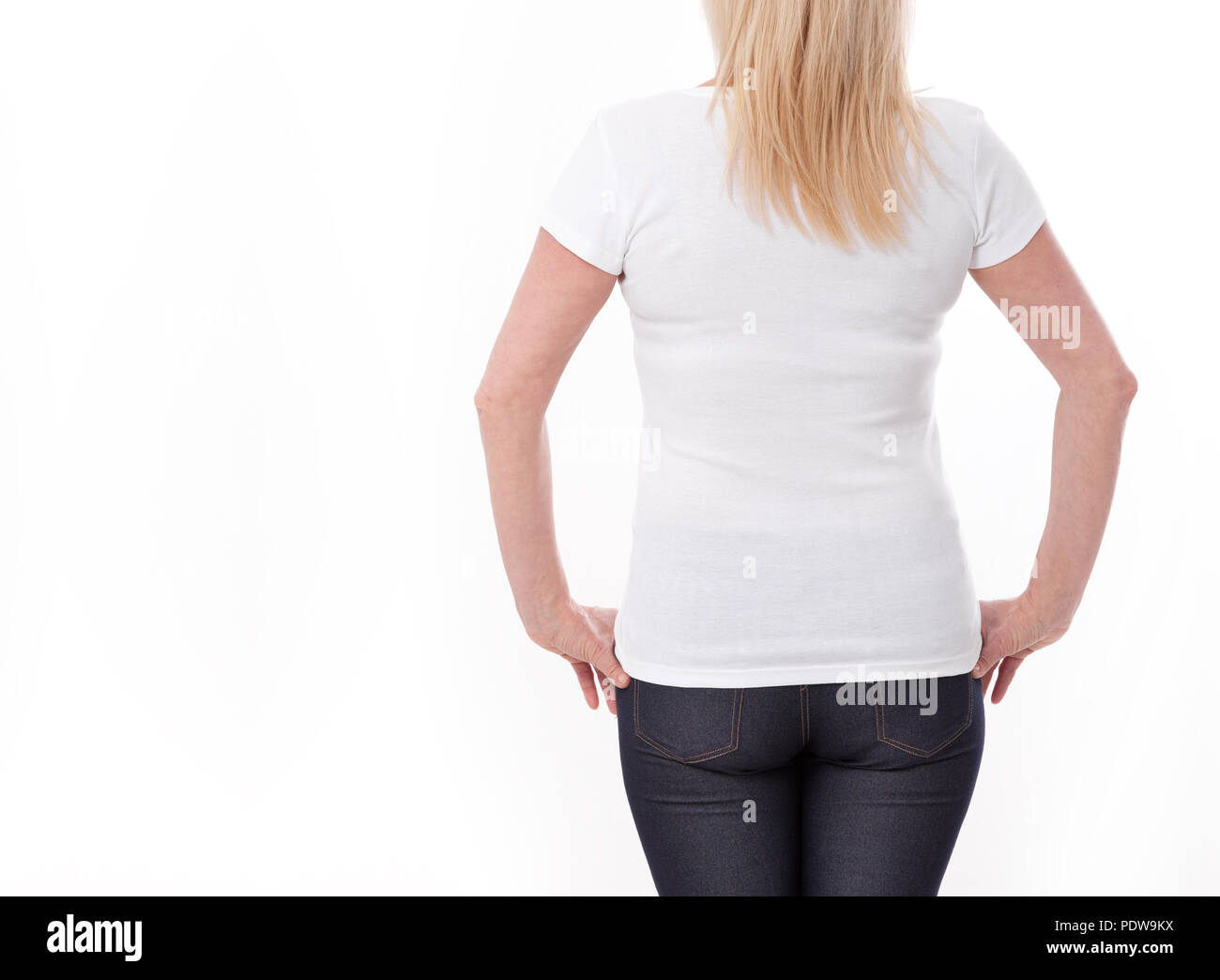 T-shirt design and people concept - close up of woman in blank white shirt, shirt rear isolated. Mock up. Stock Photo