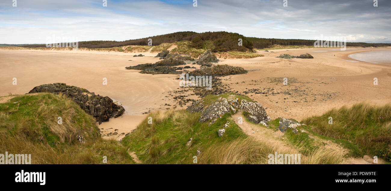 UK, Wales, Anglesey, Newborough, Penrhos and Llanddwyn beaches from island headland, panoramic Stock Photo