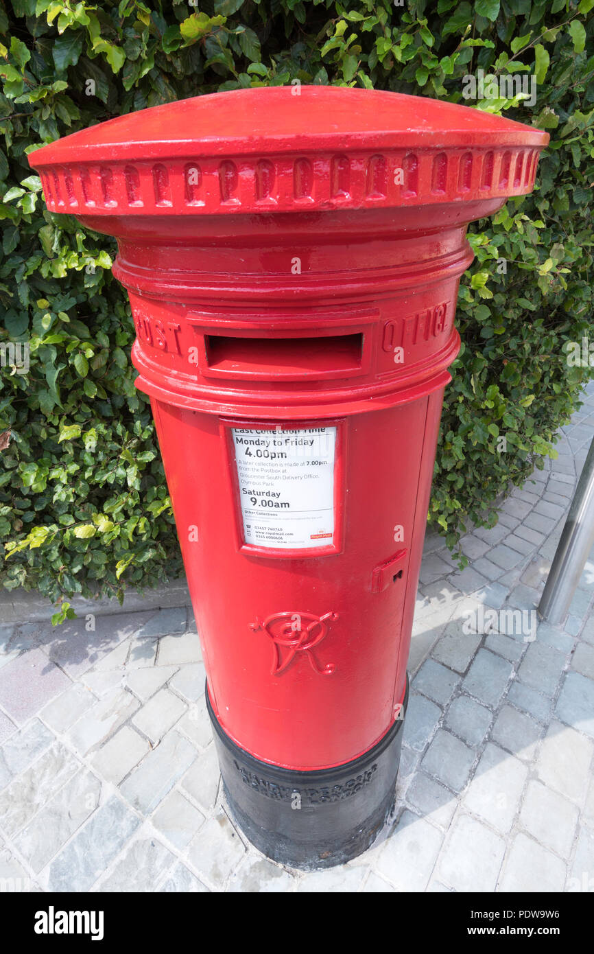 Traditional Victorian red cast iron postbox, Gloucester, Gloucestershire, England, UK Stock Photo