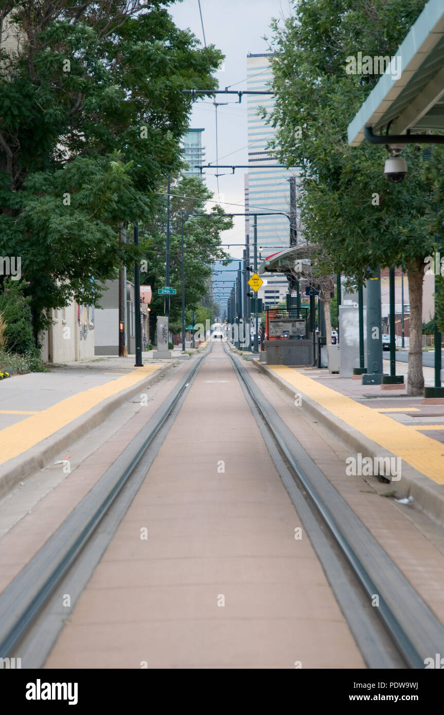 Looking down the light rail tracks on Welton Street looking into