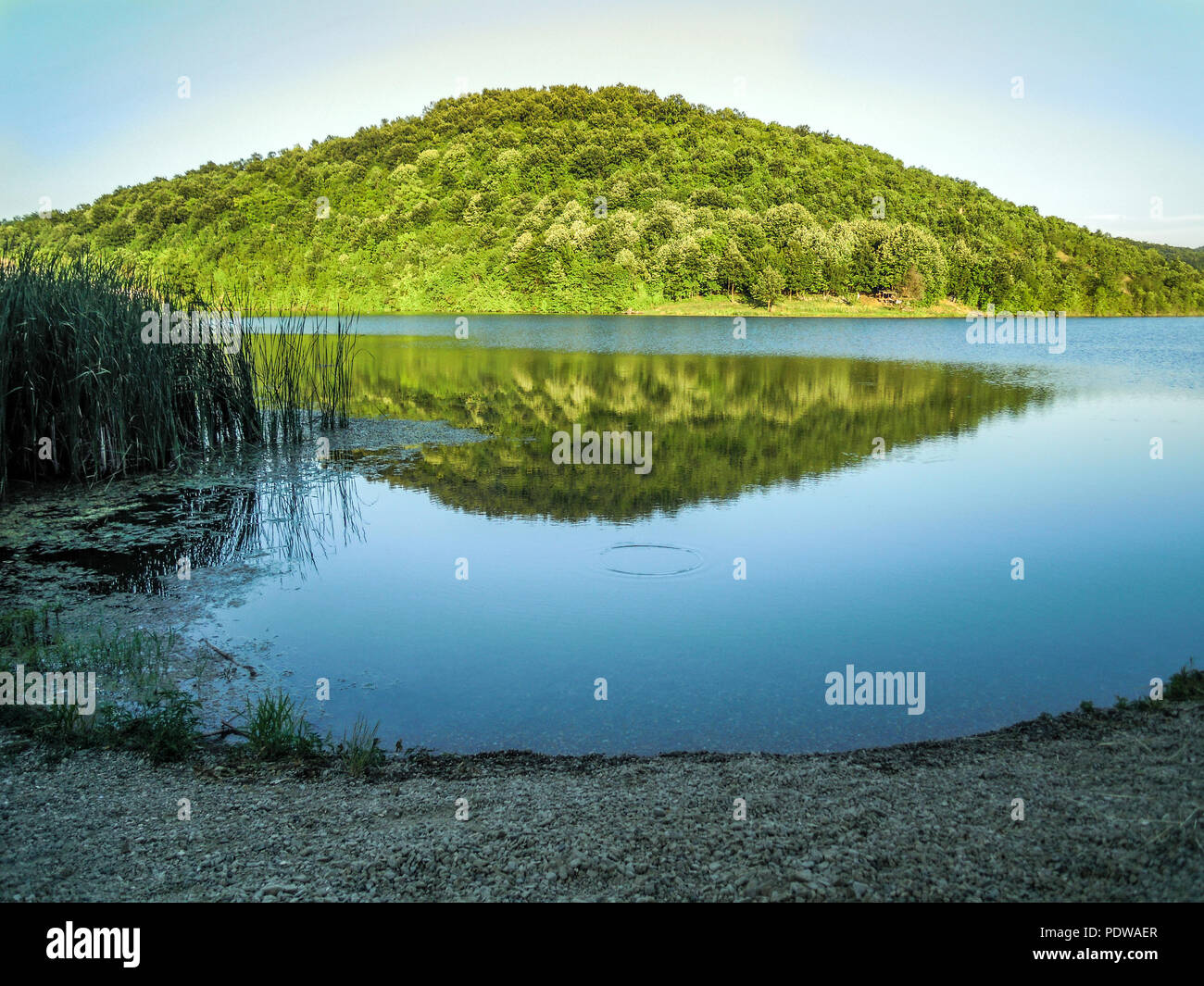 Beach at Grlisko Lake near Leskovac village. Around the beach there are plenty of moles and good places for fishing the famous fish species (the Zende Stock Photo