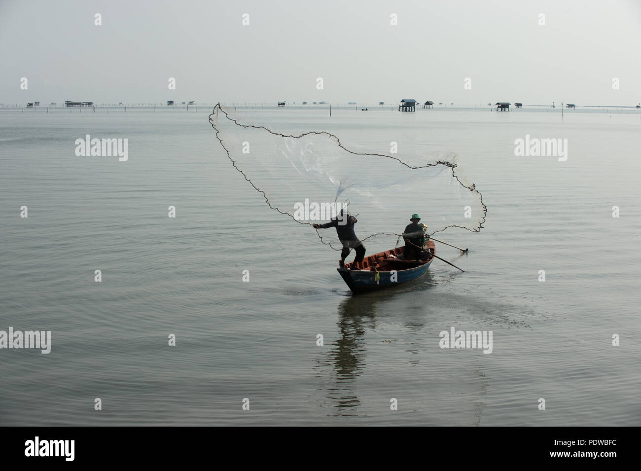 Casting a net hi-res stock photography and images - Alamy