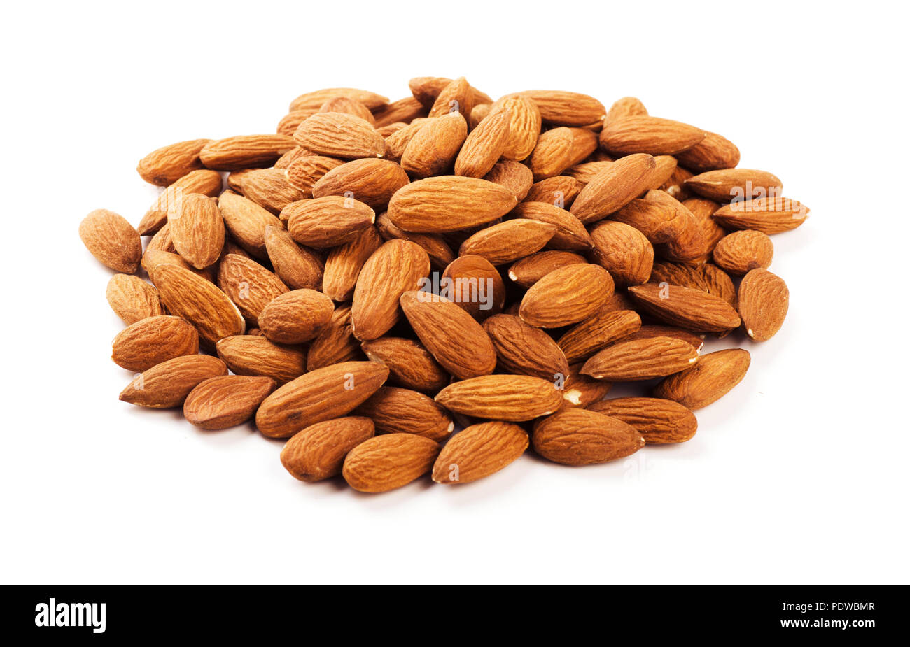 Heap of almonds isolated on white background Stock Photo