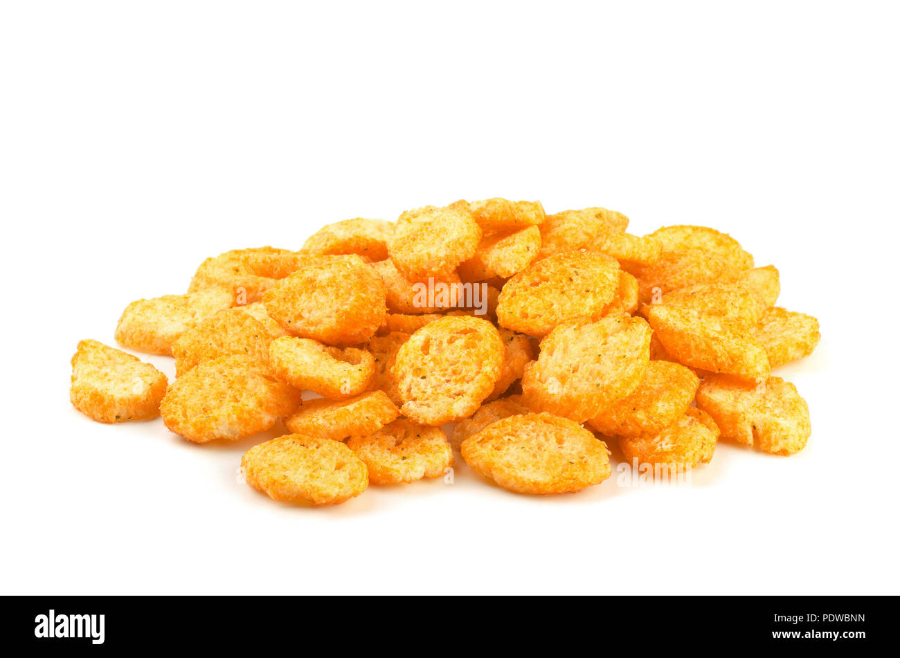 Pile of seasoned bread croutons sticks isolated over the white background Stock Photo