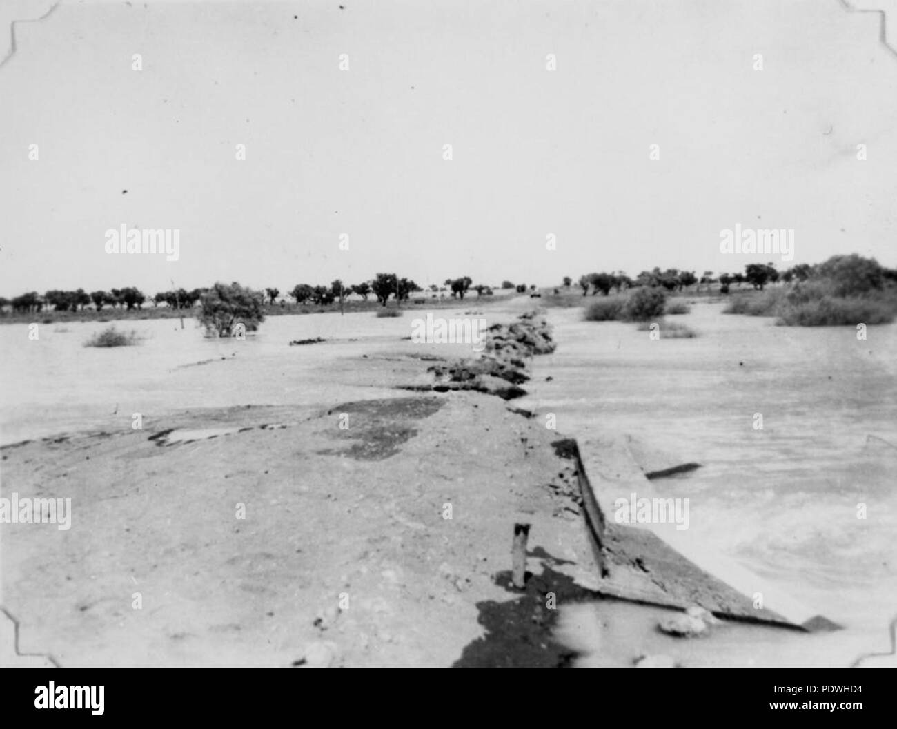 236 StateLibQld 1 163755 Receding floodwaters on Dead Horse Culvert