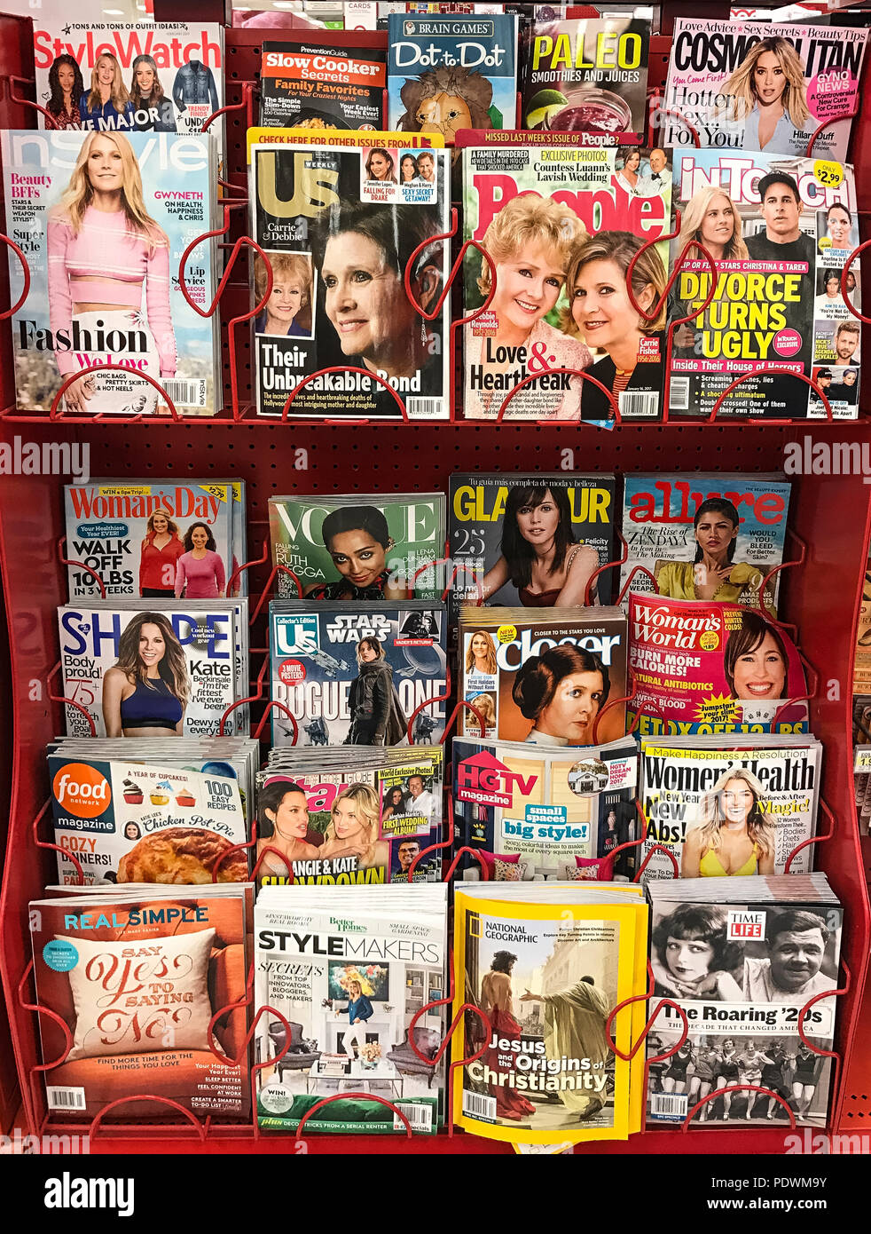 News stand selection of popular magazines. Stock Photo