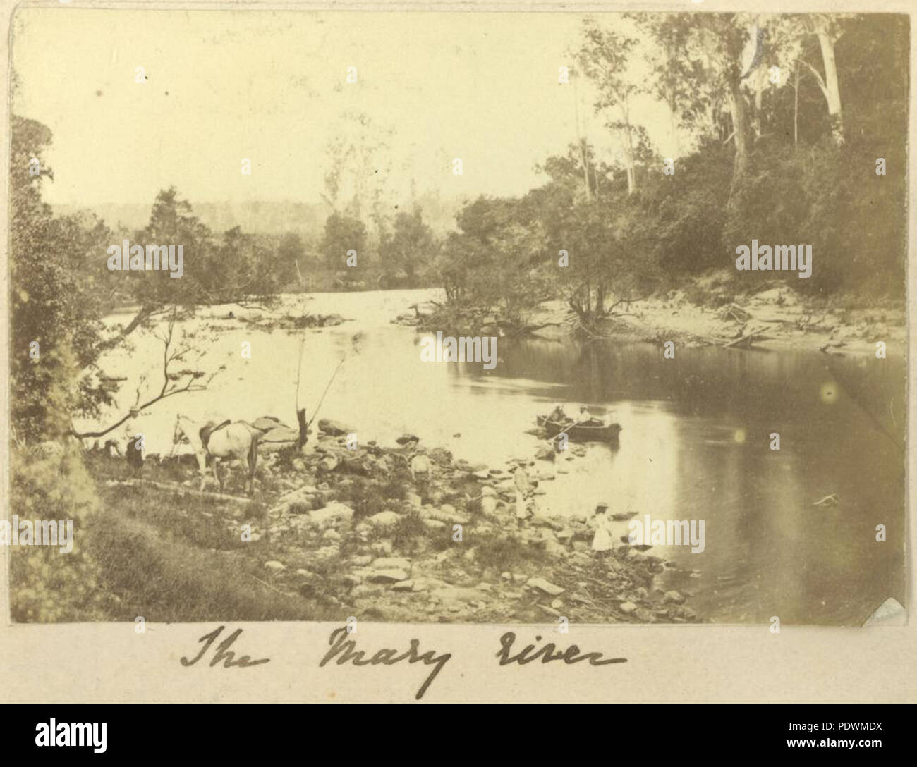 257 StateLibQld 1 254163 Boating on the Mary River, near Maryborough, ca. 1867 Stock Photo