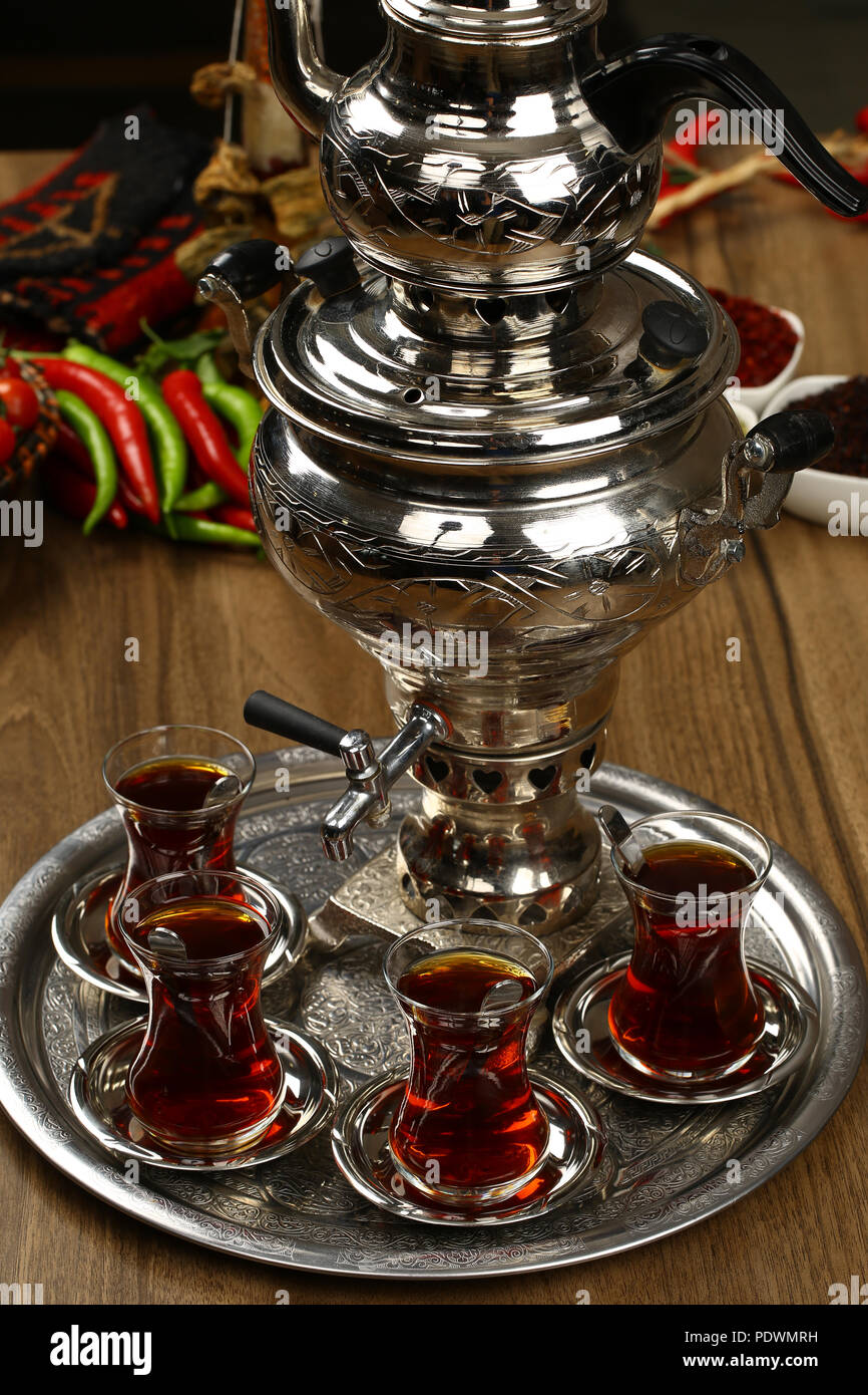 https://c8.alamy.com/comp/PDWMRH/turkish-tea-pot-with-glass-of-tea-PDWMRH.jpg