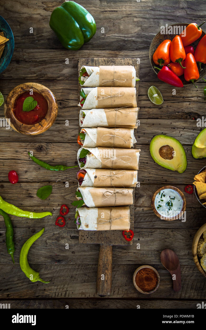 Tortilla wraps with vegetables. Mexican tortillas. Tacos with nachos