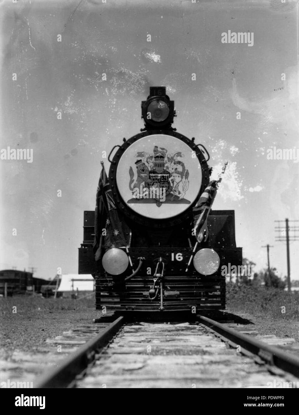 279 StateLibQld 2 102584 Royal train, decorated with their Coat of Arms ...