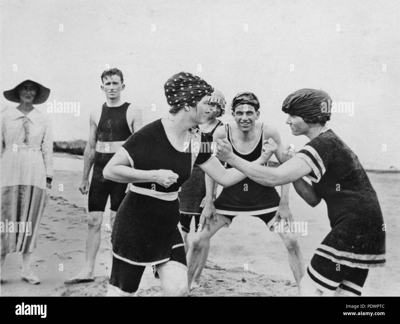 279 StateLibQld 2 108988 Ladies boxing at the beach Stock Photo