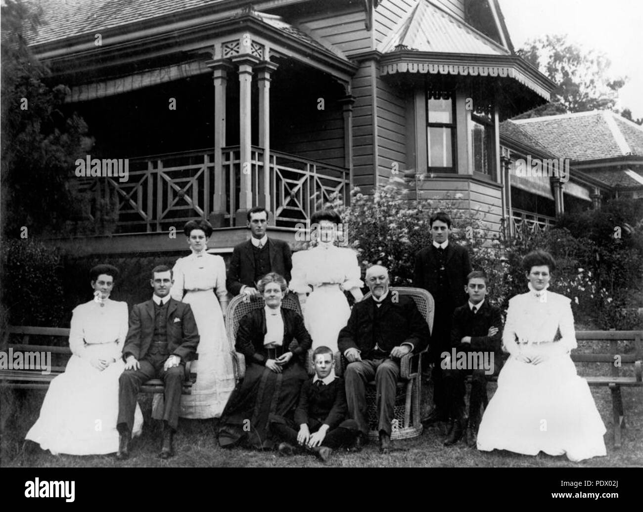 232 StateLibQld 1 150375 James Hall and family outside their residence, Ivanhoe, Brisbane, ca. 1909 Stock Photo