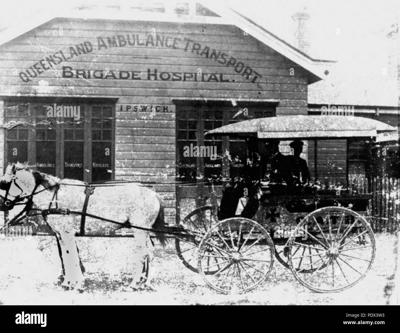 248 StateLibQld 1 197471 Horsedrawn ambulance in front of the QATB Hospital, Ipswich, ca. 1908 Stock Photo