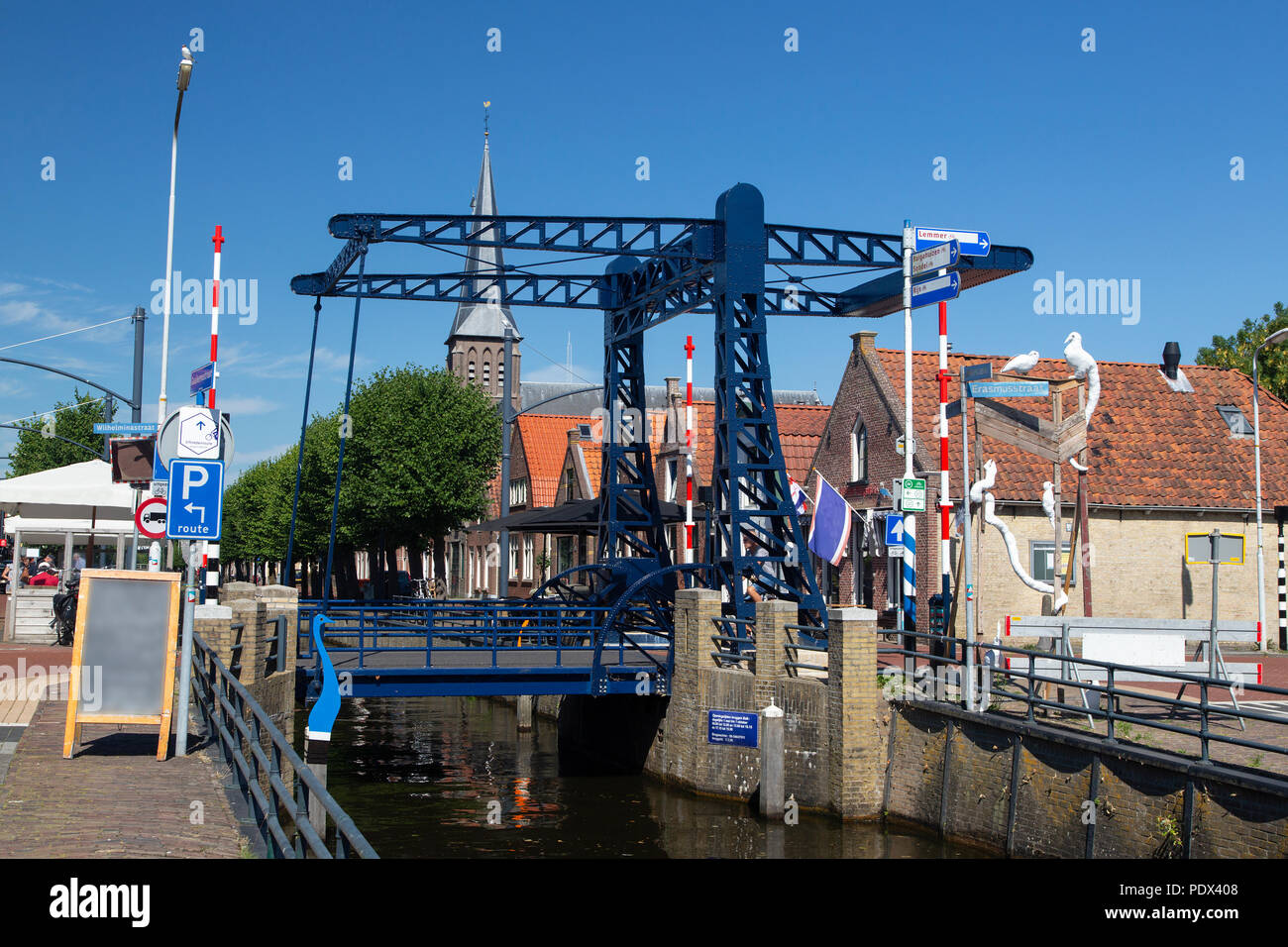Iron drawbridge across Dutch canal Stock Photo