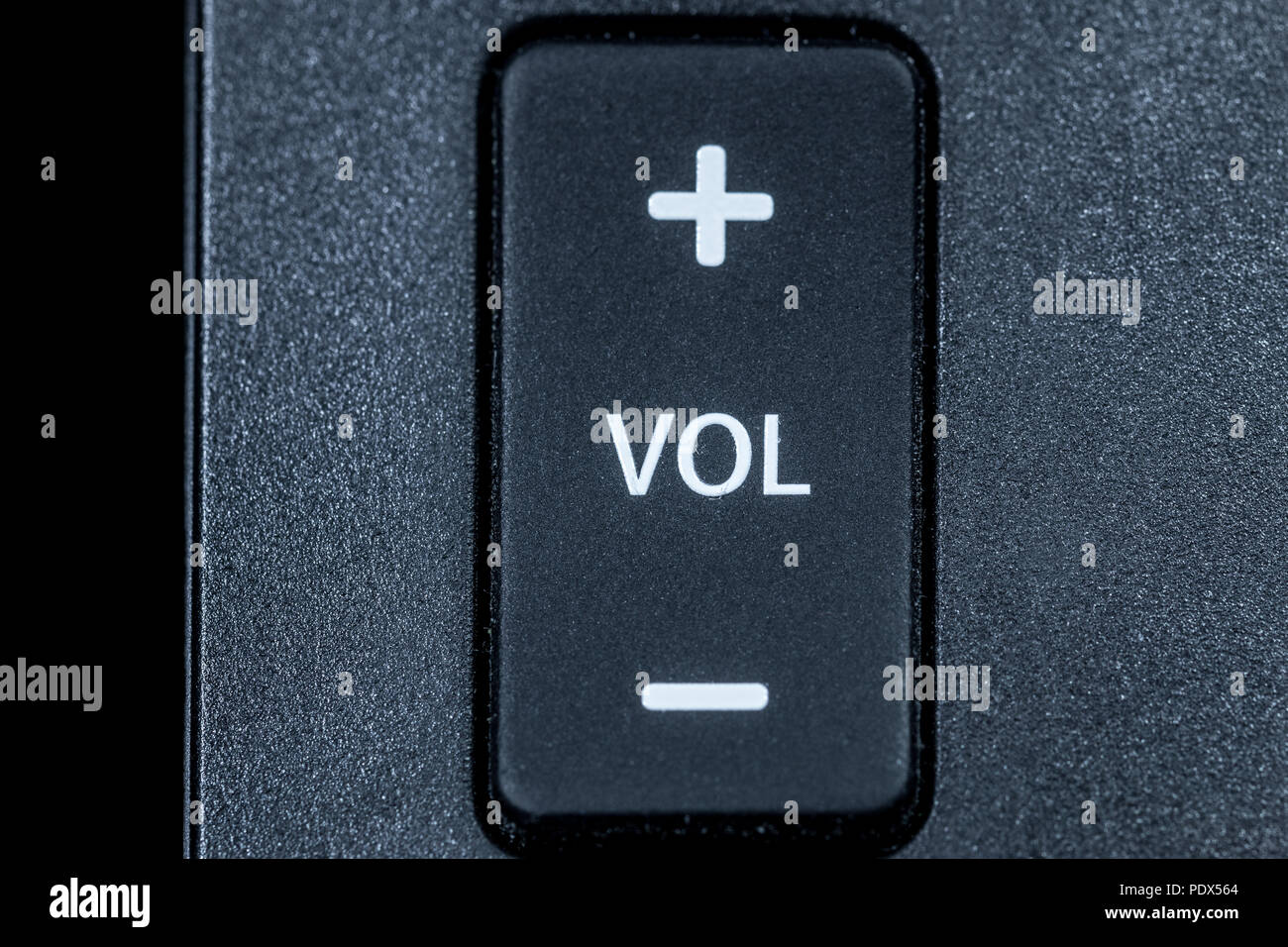 Volume switch on a remote control Stock Photo
