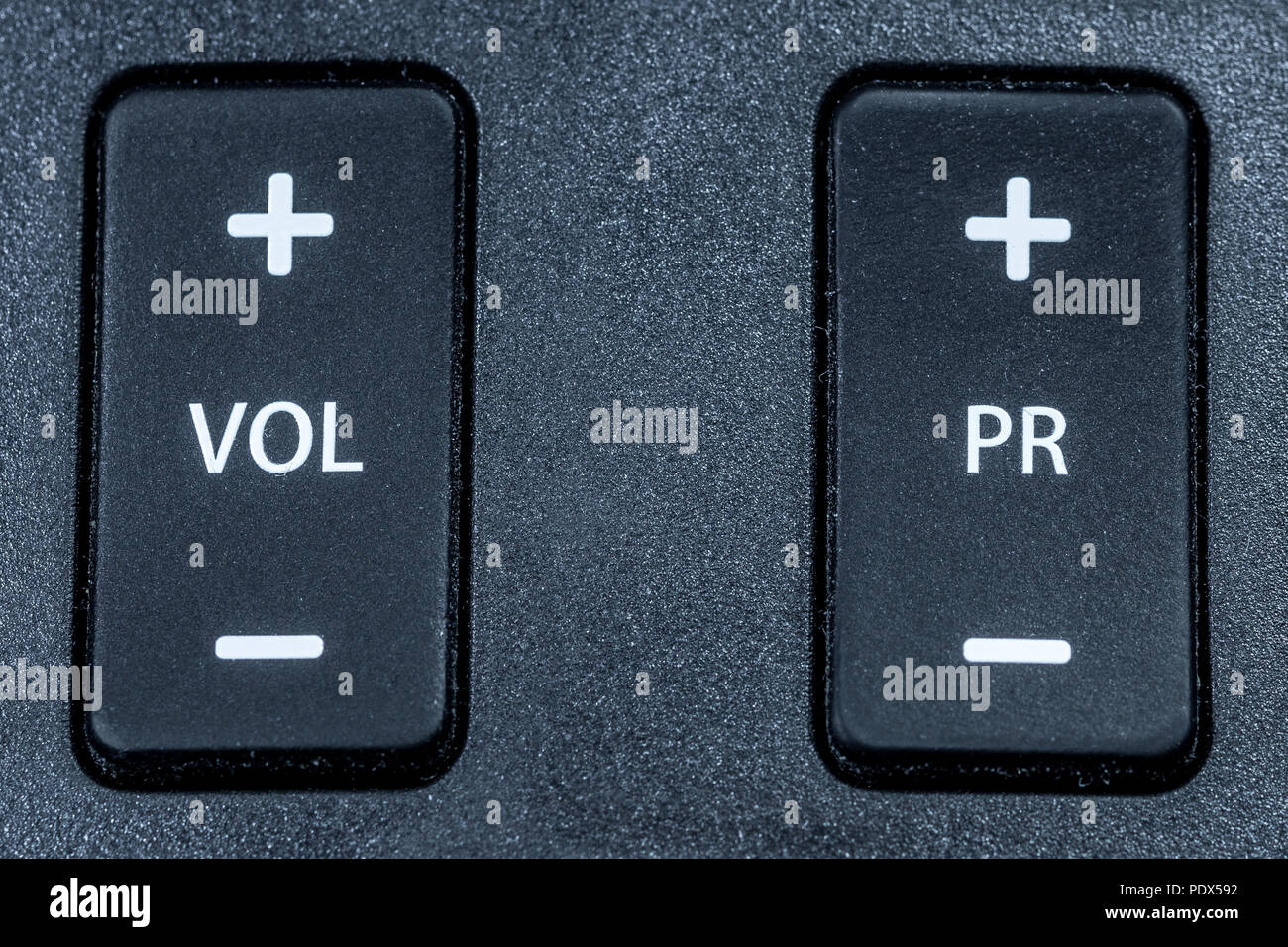 Program switch and volume switch on a remote control Stock Photo