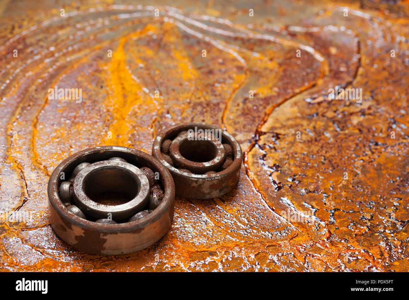 Rusty ball bearing with the rusty background Stock Photo Alamy