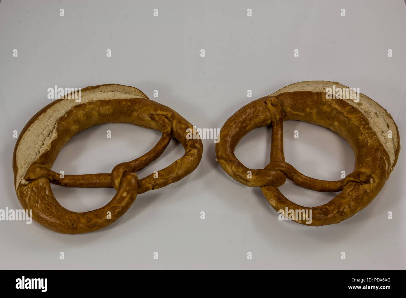 Old German pretzels on white background Stock Photo