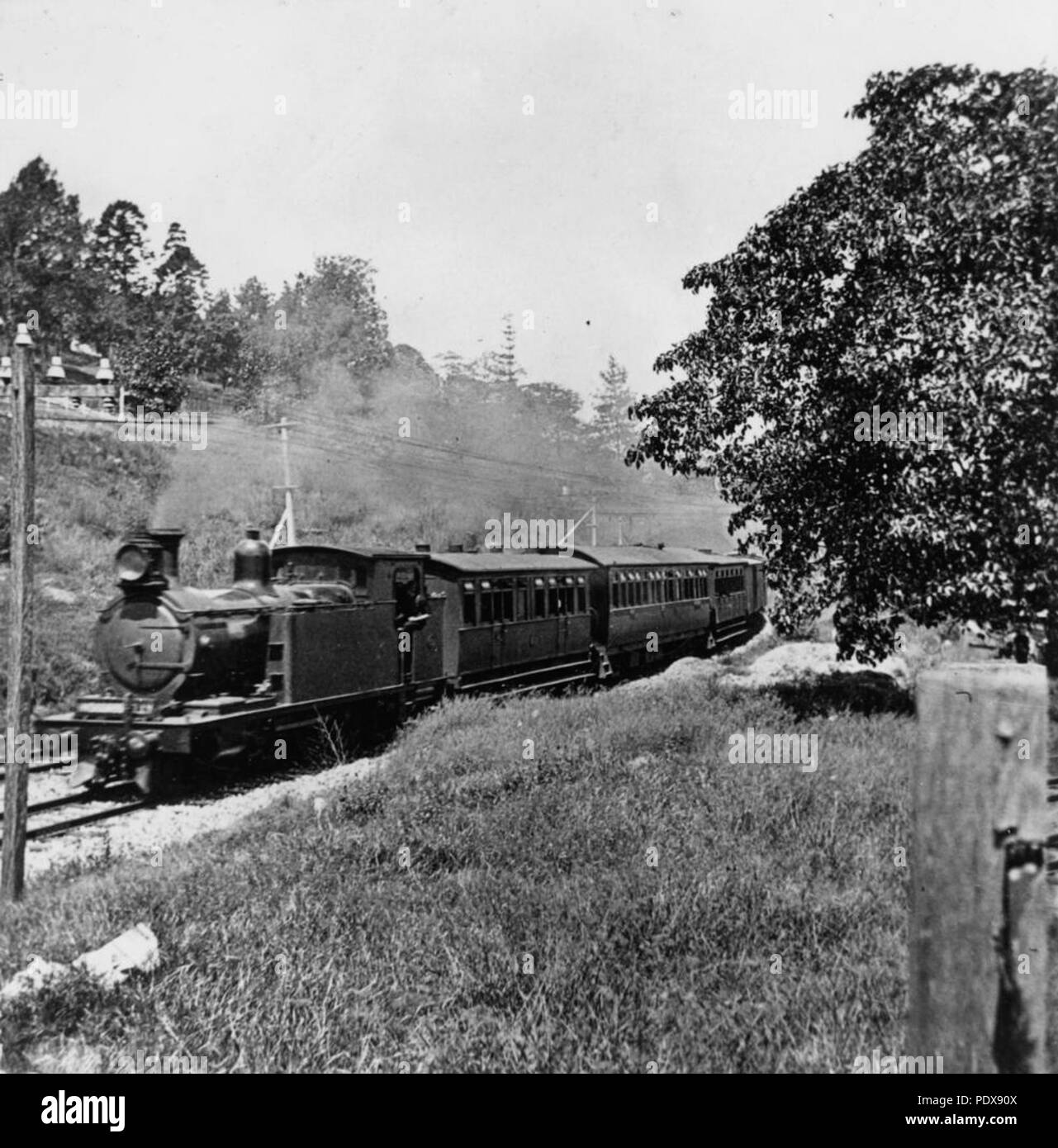 274 StateLibQld 1 84692 Passenger train outside Roma Street Station ...