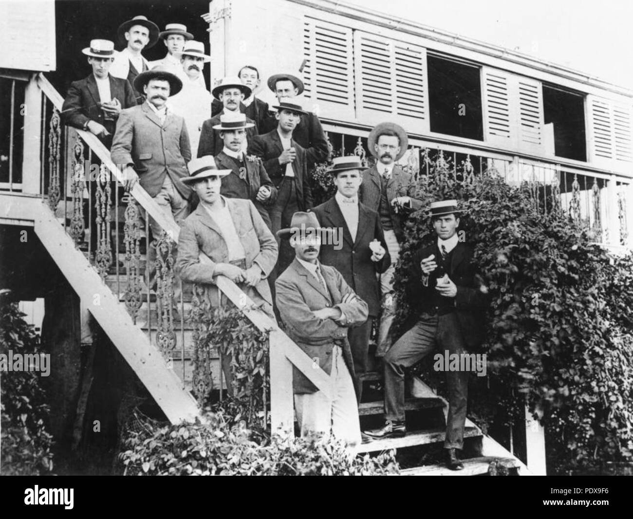 276 StateLibQld 1 90296 Victor Trumper's Australian Cricket XI, on the steps of Woodlands, at Bowen, ca. 1909 Stock Photo