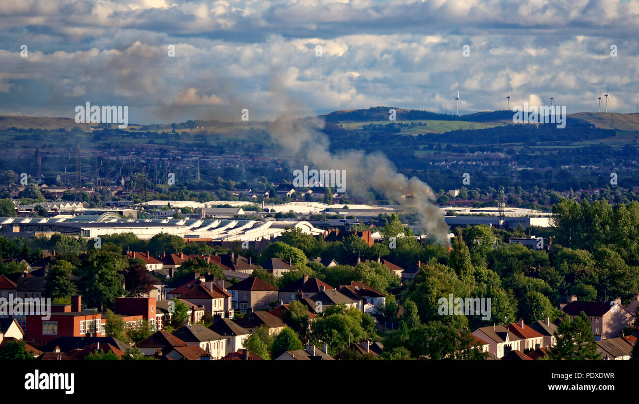 Glasgow, Scotland, UK 10th August  Another fire in the city known as the tinderbox due to a long history of disasters finds a drifting of smoke in the Scotstoun area from yet another burning, even a local one. Gerard Ferry/Alamy news Stock Photo